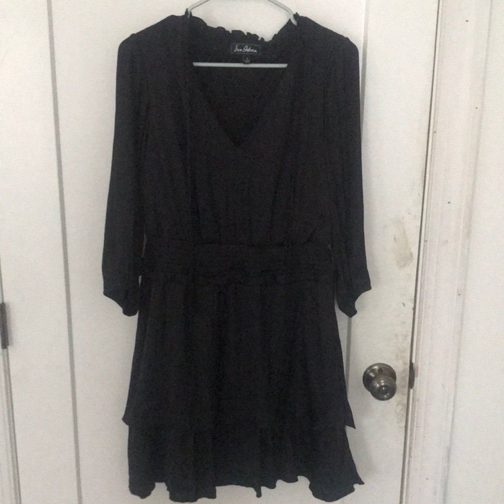 Only tried it on. Super cute drop waist black dress.